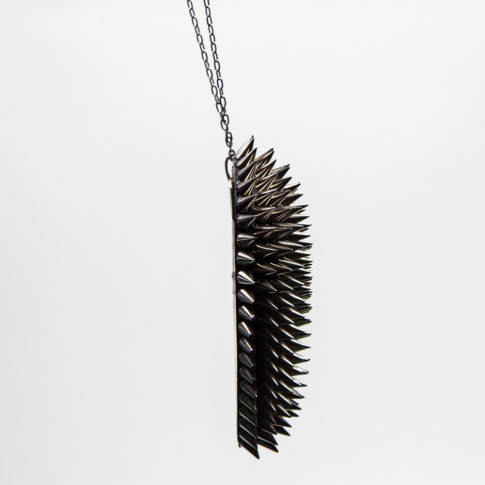 The side view of the morningstar heartbreaker necklace showcases the craftsmanship of this piece.
