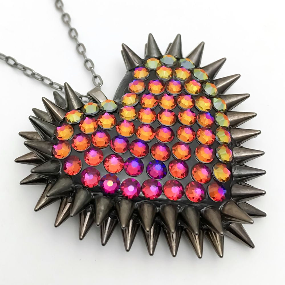 Handmade resin heart with gunmetal spikes and swarovski crystal volcano
